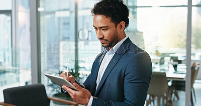 Buy stock photo Serious, businessman and writing on tablet in office for credit application review, loan agreement or sign. Financial analyst, stylus or digital signature for investment contract or wealth management