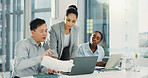 Business people, laptop and meeting with paperwork for proposal, finance or accounting report at office. Group of employees, documents and discussion for company revenue, profit or financial growth