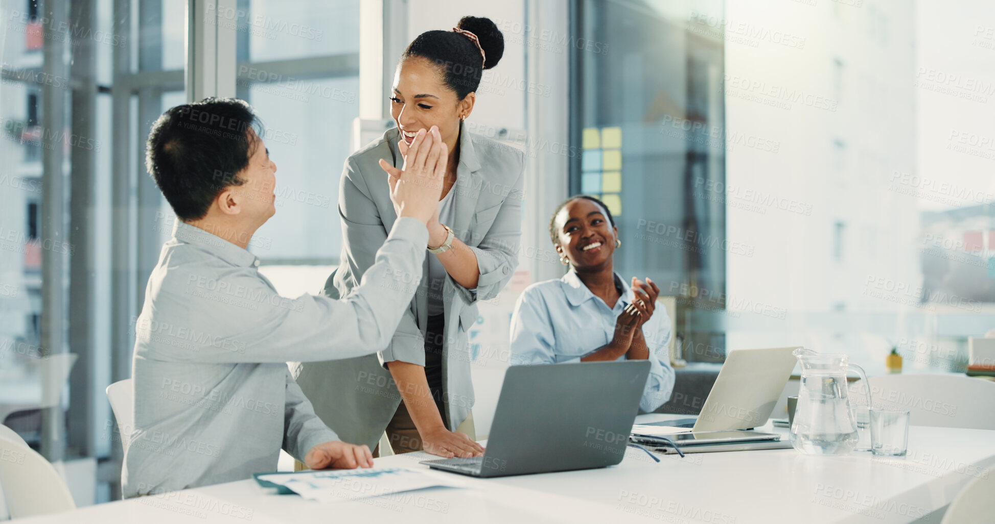 Buy stock photo High five, laptop and business people in office with discussion for finance report planning with team. Happy, celebration and financial advisors with investment approval in collaboration in workplace