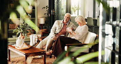 Buy stock photo Coffee, laughing and relax with old couple in living room of home together for break or wellness. Drink, funny and love with happy senior people in apartment for bonding, me time or retirement