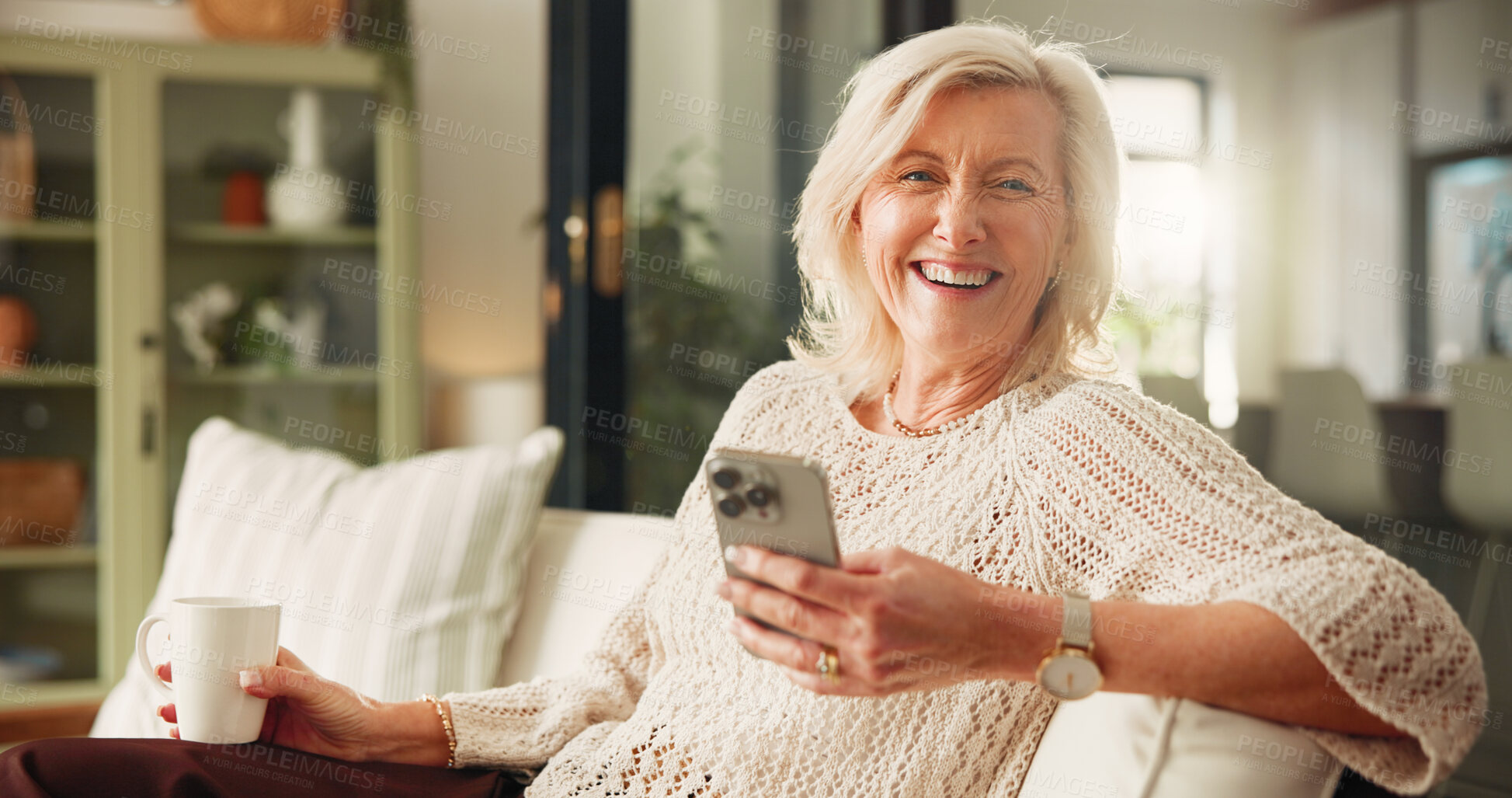 Buy stock photo Home, smartphone and old woman with smile, portrait and funny meme with social media. Apartment, laughing and mature person on couch, cellphone and message to contact, comedy and app for online humor