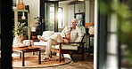 Elderly man, relax and phone call in home for communication, story update or chat in retirement. Mobile, smile and senior person in living room for connection, news or talking with contact on sofa