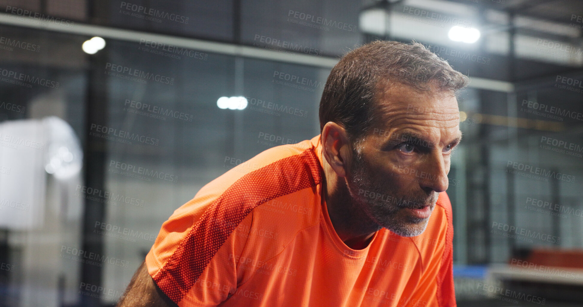 Buy stock photo Padel, sports and mature man with sweat, tired and rest after game, match and training for challenge. Indoor court, break and person breathe with fatigue for workout, exercise and fitness for tennis