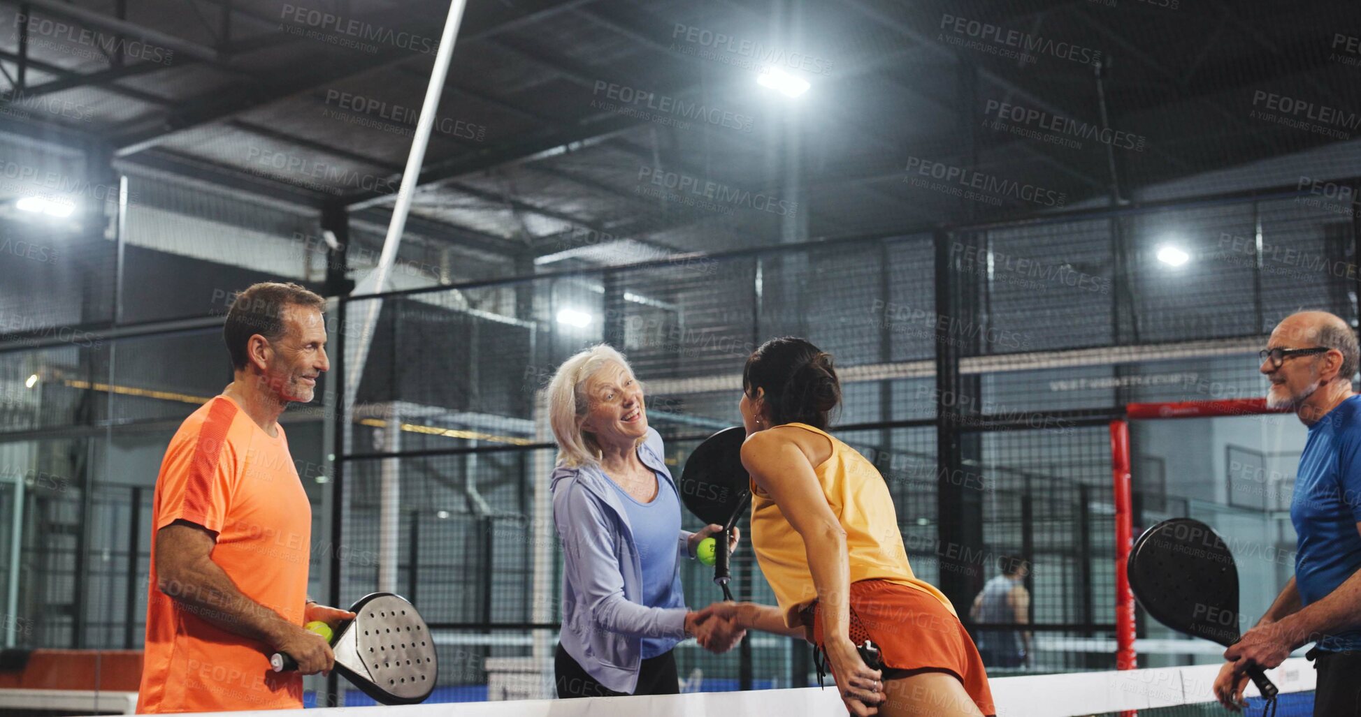 Buy stock photo Padel, athletes and greeting with handshake, court and gesture for friendly match, fitness and sport. Tennis players, challenge and shaking hands for introduction, mature people and together for game