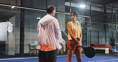 Buy stock photo Padel, woman and coach on court, practice and planning for match, talk and strategy for competition. Tennis player, mature people and prepare for game with instructor, team and training for sport