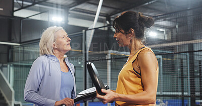 Buy stock photo Padel, talking and fitness with friends on court for training, tournament club and challenge. Sports athlete, discussion and health with mature women on turf for competition, game and workout