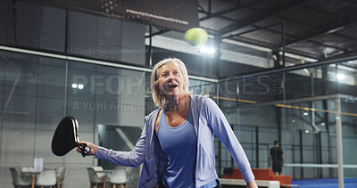 Buy stock photo Padel, fitness and woman with racket for game, tournament and competition on indoor court. Sports, athlete and mature person with ball for training, exercise and workout for match, practice or tennis