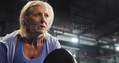 Buy stock photo Padel, space and mature woman for training, tournament and competition on indoor court. Sports club, athlete and person with racket for fitness, exercise and workout for match, practice and tennis