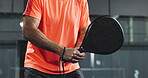 Padel, athlete and hands with racket, court and training for challenge, fitness and active for sport. Tennis player, wellness and person with equipment for competition, exercise and skills for match