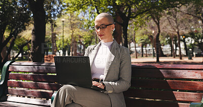 Buy stock photo Laptop, typing and business woman on park bench for legal report, policy update and research. Contract clause, online attorney review and planning with person outdoor for email and court case  