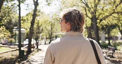 Buy stock photo Businessman, back or walking in park for commute, morning reflection or contemplate career growth. Daily journey, thinking or person with opportunity ideas, outdoor perspective or travel to workplace
