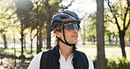 Man, courier and thinking with helmet at park, bag and reflection with direction, commute or service. Person, safety and backpack for delivery, sunglasses and eco friendly transportation in Germany