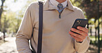 Phone, hands and typing with business man in park for communication, social media and search. Commute, networking app and connection with person and mobile outdoor for professional, contact or travel