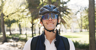 Buy stock photo Man, courier and portrait with helmet at park, smile and confident with pride, commute or service. Person, safety and backpack for delivery with eco friendly transport, happy or sunglasses in Germany
