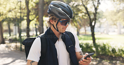 Buy stock photo Delivery, reading and phone with man in park for package distribution, courier route app and shipping. Online order, search and ecommerce parcel with person and mobile outdoor for export and cargo