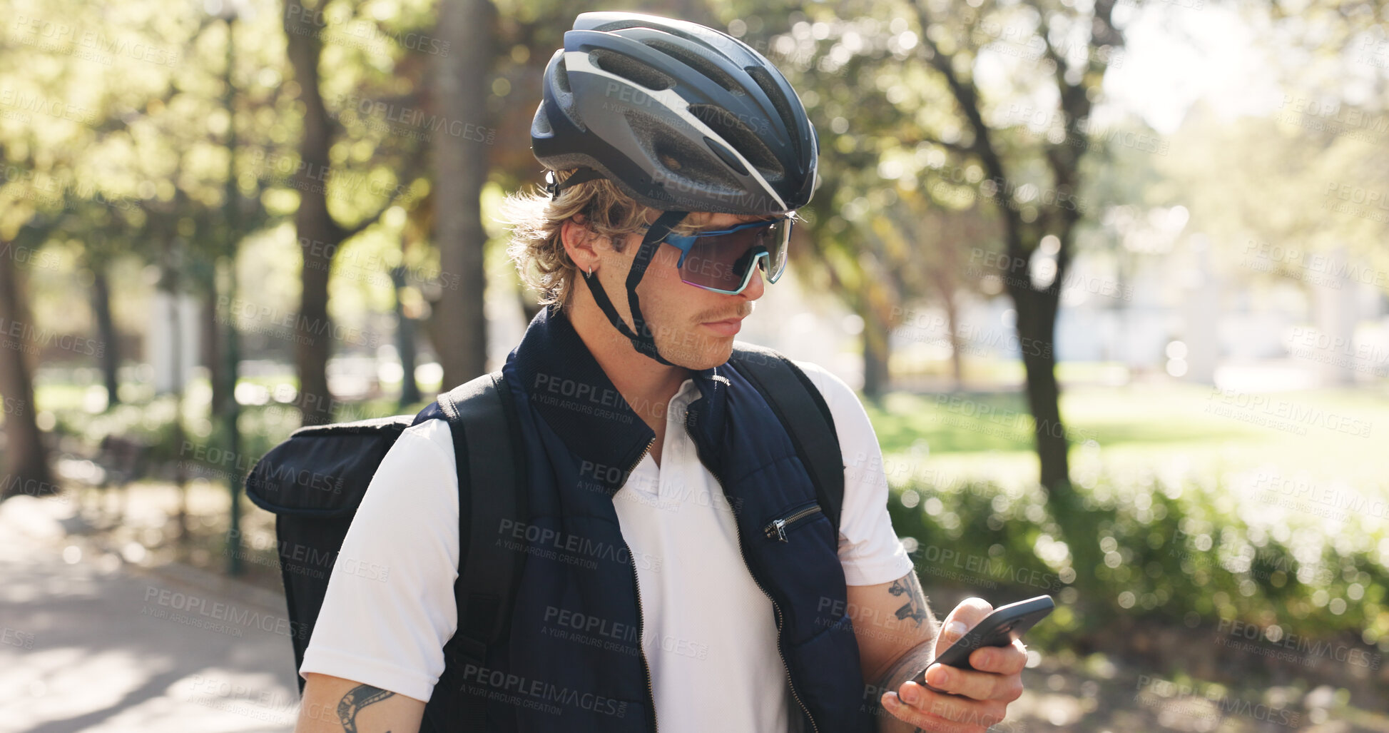 Buy stock photo Delivery, reading and phone with man in park for package distribution, courier route app and shipping. Online order, search and ecommerce parcel with person and mobile outdoor for export and cargo