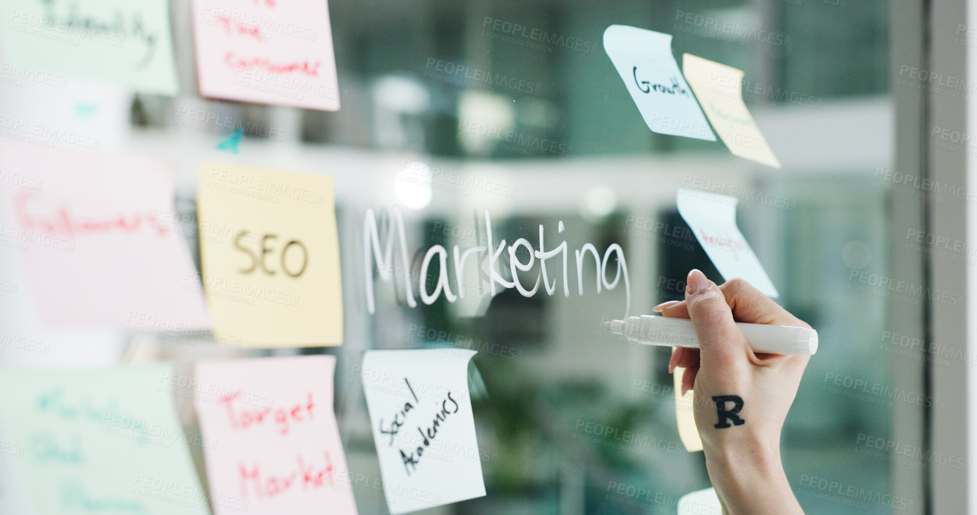 Buy stock photo Advertising, hands and writing on glass wall for business growth, seo plan or target audience trends. Marketing, increase awareness and person at board with sticky note, strategy or goal for campaign