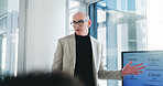 Presentation, screen and businessman in office with proposal, stats review or plan for b2b strategy. Mature person, talking and pitch with tech for profit idea, financial investment or data analysis.