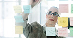 Business woman, writing or sticky note on glass wall for advertising, seo plan or target audience trends. Digital marketing, brand awareness or manager at board for campaign project, strategy or goal