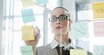 Woman, writing or sticky note on glass wall for business growth, seo planning or target audience trends. Digital marketing, brand awareness or manager at board for campaign project, strategy or goals