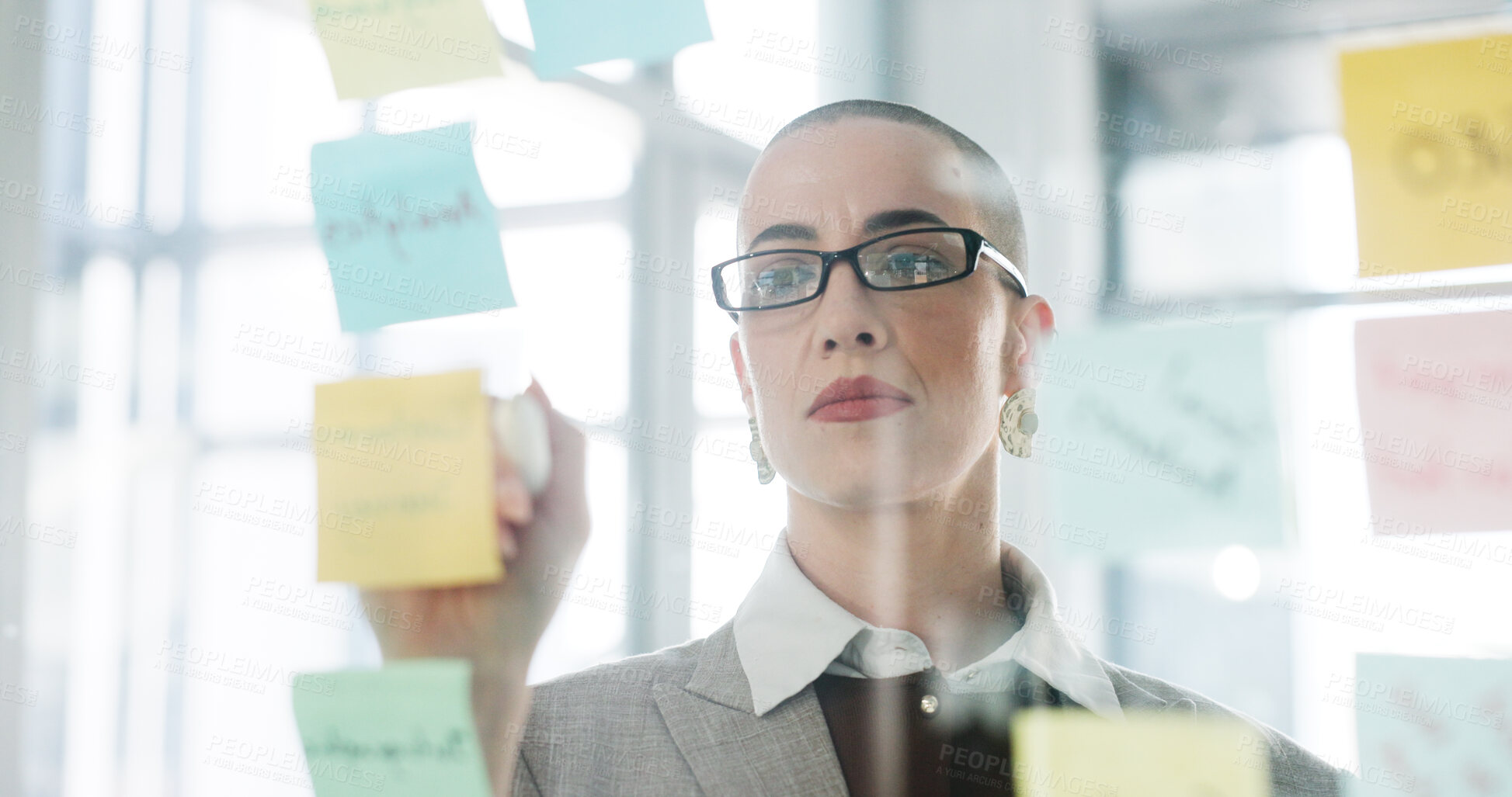 Buy stock photo Woman, writing or sticky note on glass wall for business growth, seo planning or target audience trends. Digital marketing, brand awareness or manager at board for campaign project, strategy or goals