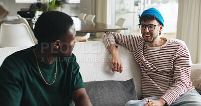 Buy stock photo Happy men, friends and talk on sofa with gossip for funny story, bonding together and weekend hangout. People, chill and smile with conversation for wellness, connection or humor in home living room.