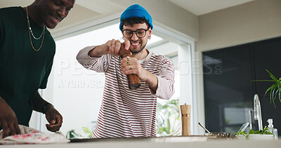 Buy stock photo Cooking, ingredients and pepper with friends in kitchen together for hunger or meal preparation. Flavor, recipe and seasoning with happy roommate people in apartment for diet, health or nutrition