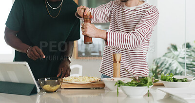 Buy stock photo Hands, people and cooking with tablet at house for online recipe, meal prep and organic ingredients. Friends, digital and seasoning for Italian pizza, tutorial and culinary skills for homemade lunch