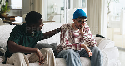 Buy stock photo Support, grief and friends on sofa with console, comfort and understanding during bereavement. Mental health, empathy and people in house with conversation, condolences and shoulder rub in mourning.