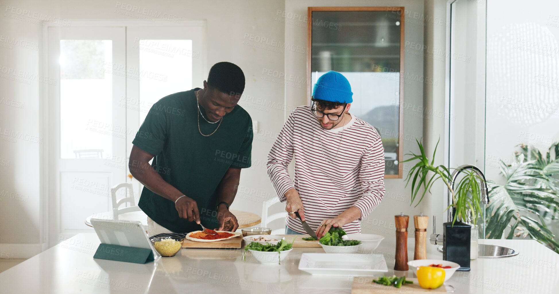 Buy stock photo Cooking, ingredients and pizza with friends in kitchen of home together to follow online recipe tutorial. App, tablet and video instructions with roommate people in apartment for meal preparation