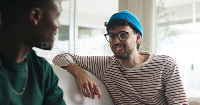Buy stock photo Happy men, friends and laugh on sofa with gossip for funny story, bonding together or weekend hangout. People, chill and smile with conversation for wellness, connection and joke in home living room.