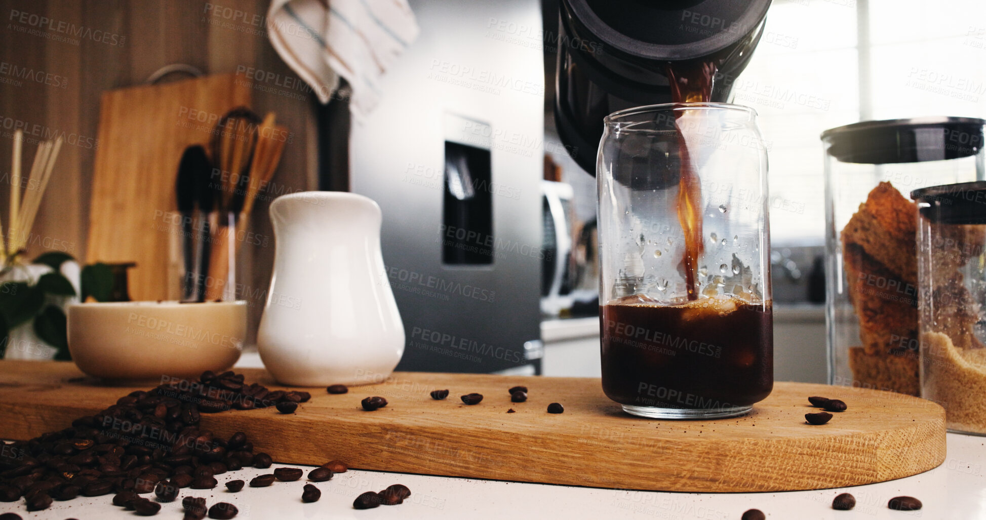 Buy stock photo Iced coffee, glass and liquid in kitchen for strong caffeine, pour or roast in home. Organic brew, drink and beans with French press for mocha, espresso or breakfast beverage in house for preparation