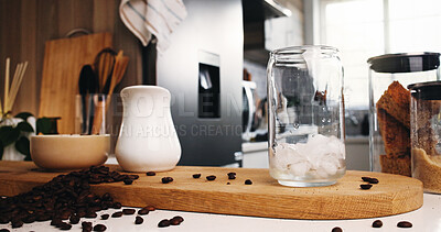 Buy stock photo Ice, coffee and glass on table in kitchen of home for caffeine beverage, breakfast and morning brew. Cappuccino, cold latte drink and prepare with cup on counter of apartment for liquid and beans