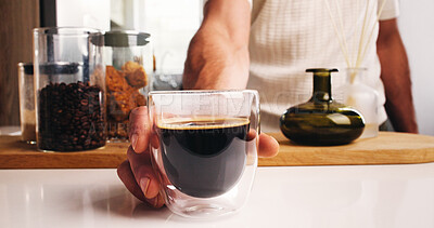 Buy stock photo Serving, hand or person in cafe with coffee, presenting or intense brew in breakfast beverage. Hospitality, service or barista in espresso bar with cold blend, glass or handling of morning drink.