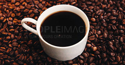 Buy stock photo Coffee production, roast and cup with beans for caffeine, espresso beverage or cappuccino blend. Background, cafeteria and closeup of drink in mug for latte, granules or organic grain for hospitality