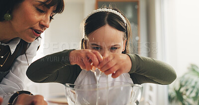 Buy stock photo Baking, egg and girl in kitchen with mother for child development. ingredients or recipe learning. Cooking, how to and single parent woman teaching daughter in apartment for culinary baker skills
