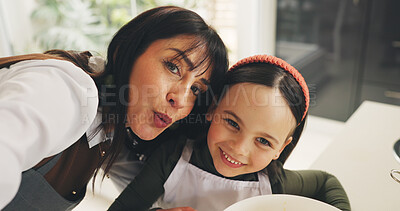 Buy stock photo Portrait, selfie and smile of mother with daughter in living room of home for bonding or memories. Love, photograph and pout of single parent woman and girl child in apartment for social media post