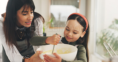 Buy stock photo Baking, mother or child with mixing bowl in kitchen, meal prep or helping with dessert for bonding. Family home, support or woman with girl to teach cooking skill, development or learning in guidance