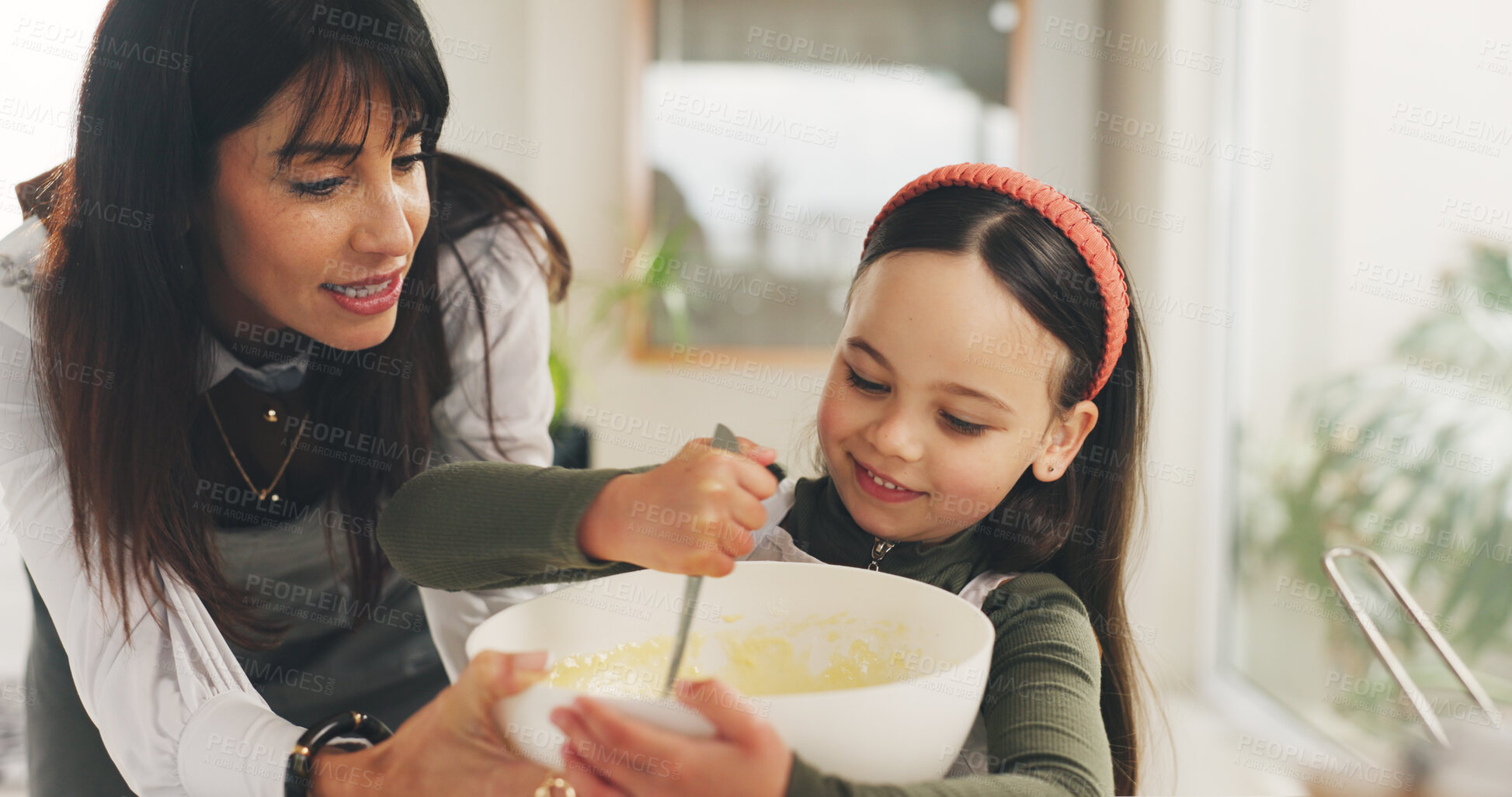 Buy stock photo Baking, mother or child with mixing bowl in kitchen, meal prep or helping with dessert for bonding. Family home, support or woman with girl to teach cooking skill, development or learning in guidance