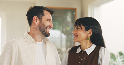 Buy stock photo Love, connection and couple in house with smile, understanding or support in relationship. Romance, mature man and woman in lounge with happiness, commitment and bonding together in marriage.