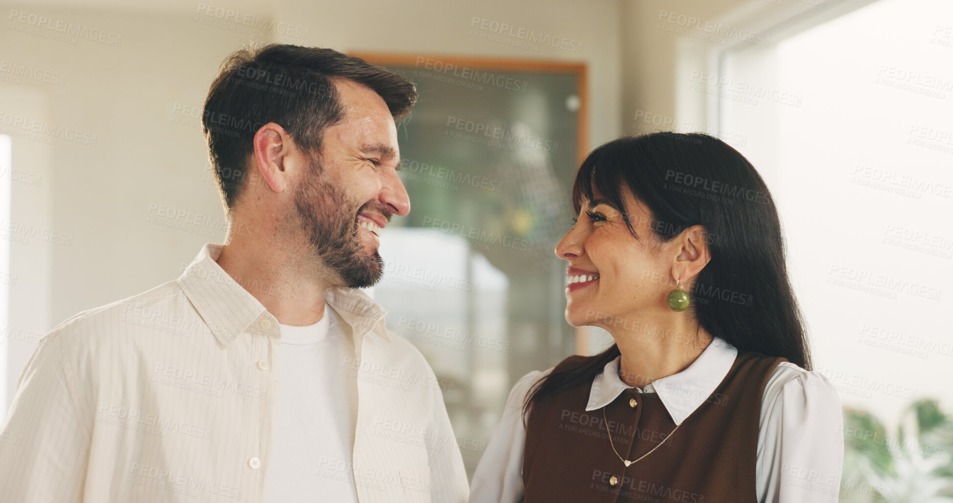 Buy stock photo Love, connection and couple in house with smile, understanding or support in relationship. Romance, mature man and woman in lounge with happiness, commitment and bonding together in marriage.