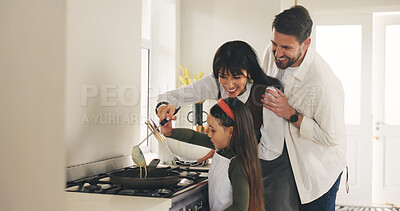 Buy stock photo Happy family, parents or child in kitchen with cooking, skill development or bonding together. People, mother or daughter with father in home for support, meal prep help or learning pancake recipe.