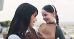 Happy, mother and child with love outdoor for travel, getaway holiday and bonding together. Smile, woman and laugh with kid for urban trip, family time and relationship connection on vacation in city