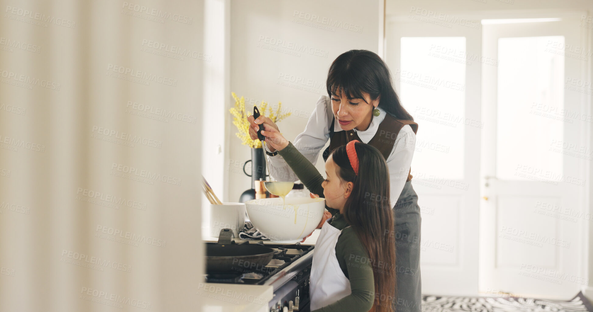 Buy stock photo Baking, ladle or teaching with mother and daughter in kitchen of home for bonding or development. Bowl, cooking or learning with girl child and single parent woman in apartment for recipe process