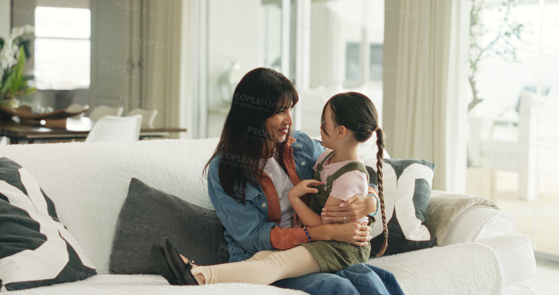 Buy stock photo Relax, support and mother with daughter on sofa of family home for bonding, hug and love. Connection, happiness and affection with woman and child in living room of apartment for trust and care