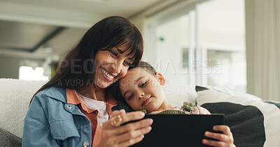Buy stock photo Tablet, happy and mother with kid on sofa in home for watching series, movie or video on app. Relax, digital technology and girl child with mom for streaming film online in living room at house.