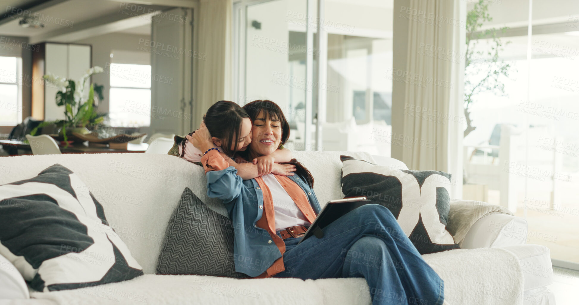 Buy stock photo Happy, hug and mom with child on sofa in home with love, support and care in living room. Smile, comfort and kid embracing mother for bonding together at house with connection, relax or family time.