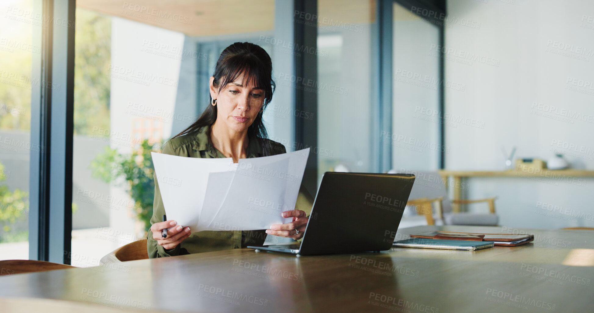 Buy stock photo Business, woman and document with laptop at house for real estate, property report and contract. Mature freelancer, pc and paperwork for sales agreement, listing information and negotiation statement