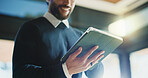 Man, realtor and hands with tablet, property management and service review in office. Low angle, estate agent and digital tech in agency for commission update, app scroll and research for reading