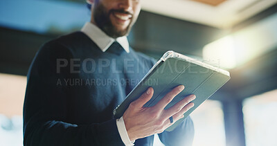 Buy stock photo Man, realtor and hands with tablet, property management and service review in office. Low angle, estate agent and digital tech in agency for commission update, app scroll and research for reading
